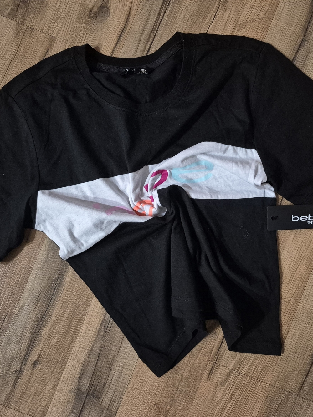 bebe Black Tee with White Colorblock and Multicolor Logo. NWT!